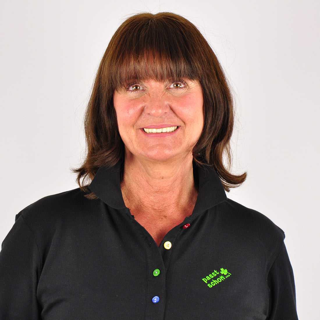 Antonia №2 – Schwarzes Langarm-Poloshirt mit giftgrüner Logostickerei